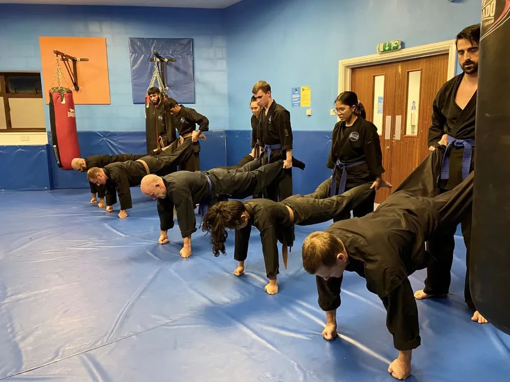 https://www.shuhari.co.uk/_app/immutable/assets/MMA_classes_for_adults_in_Maidenehad.cbd7614f.webp