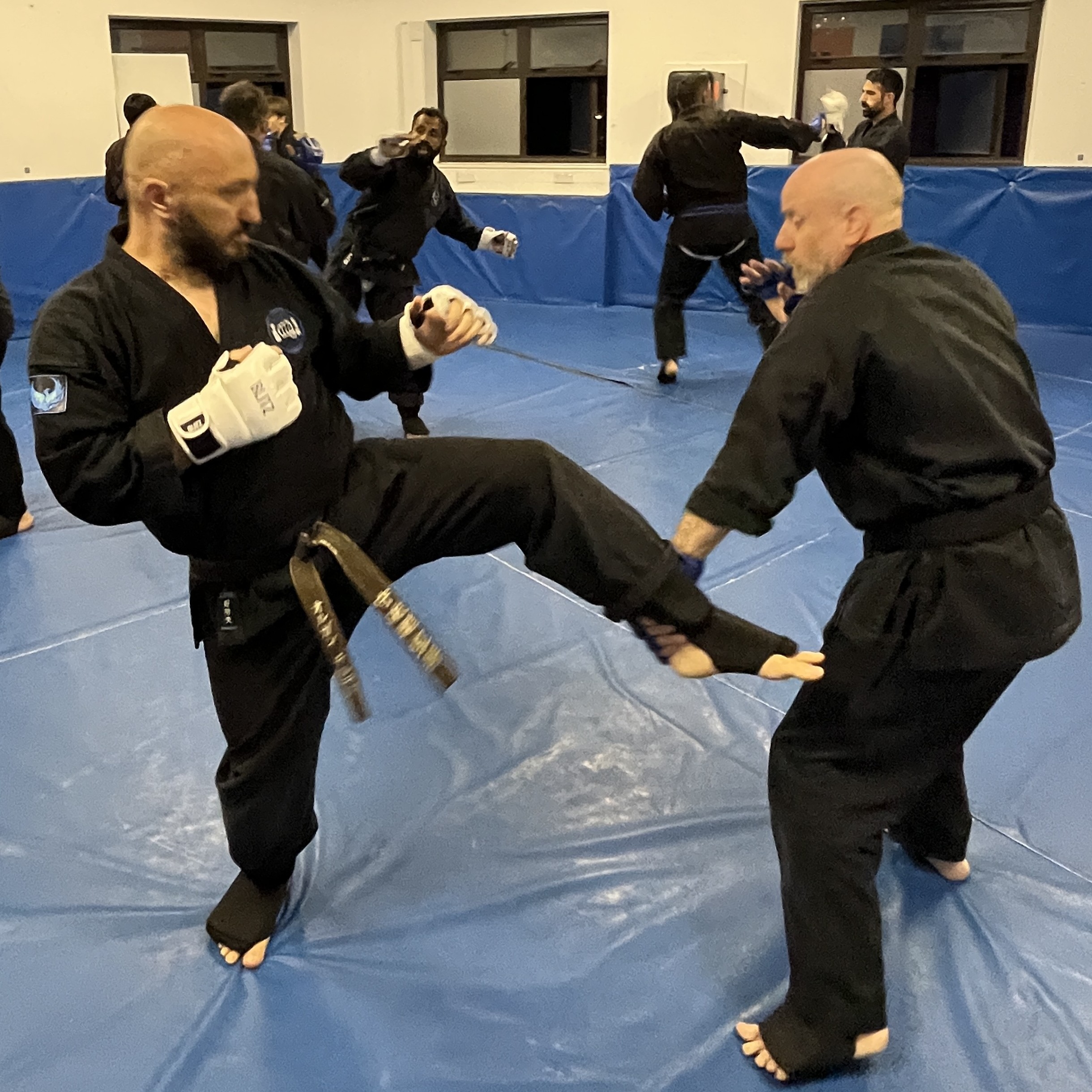 Brian Southon of Shuhari Self Defence Cippenham practicing kumite with his instructor Olgun Tiltay