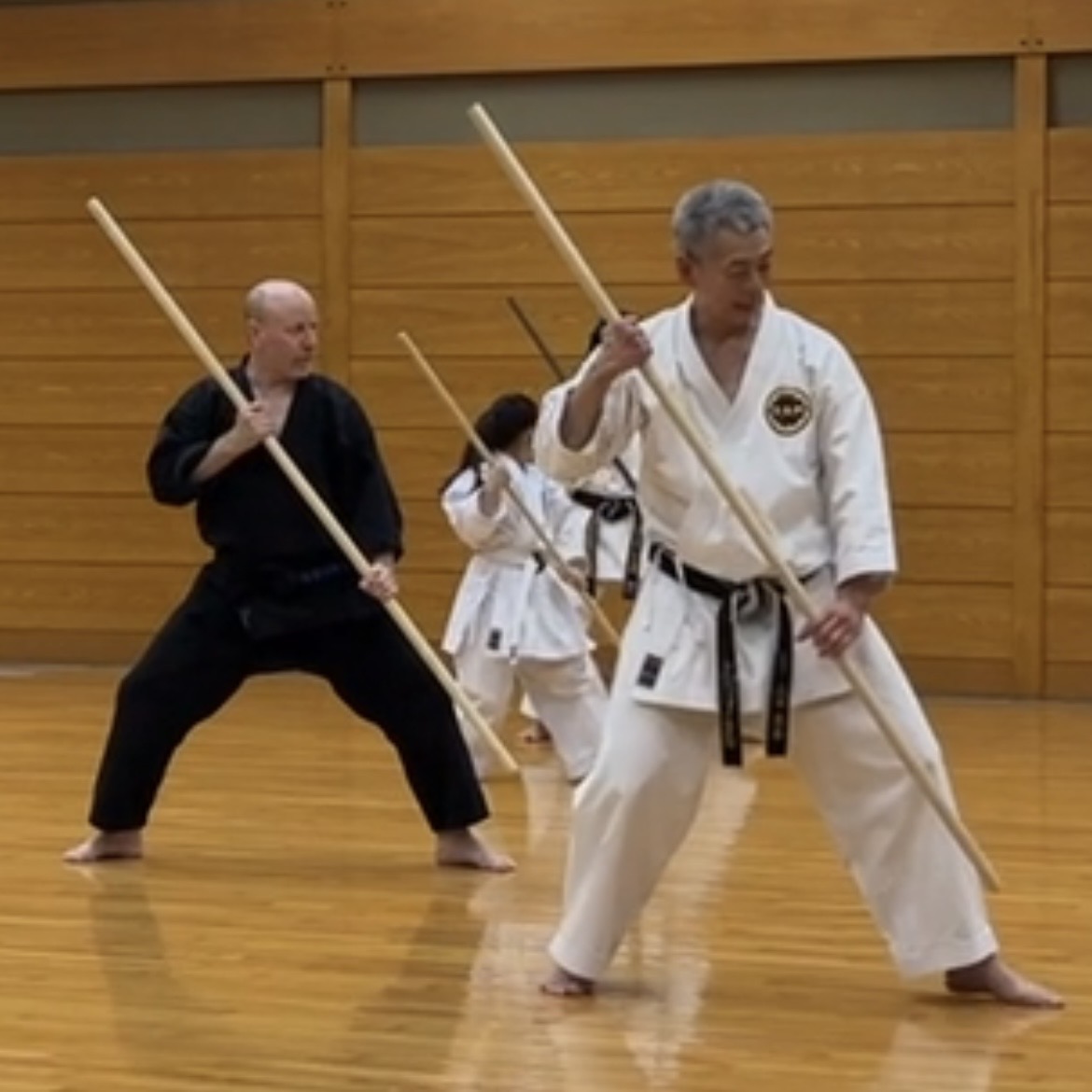 Brian Southon of Shuhari Self Defence Cippenham learning Bo [long staff] basics in Nagoya Japan from Hideki Yamada Sensei