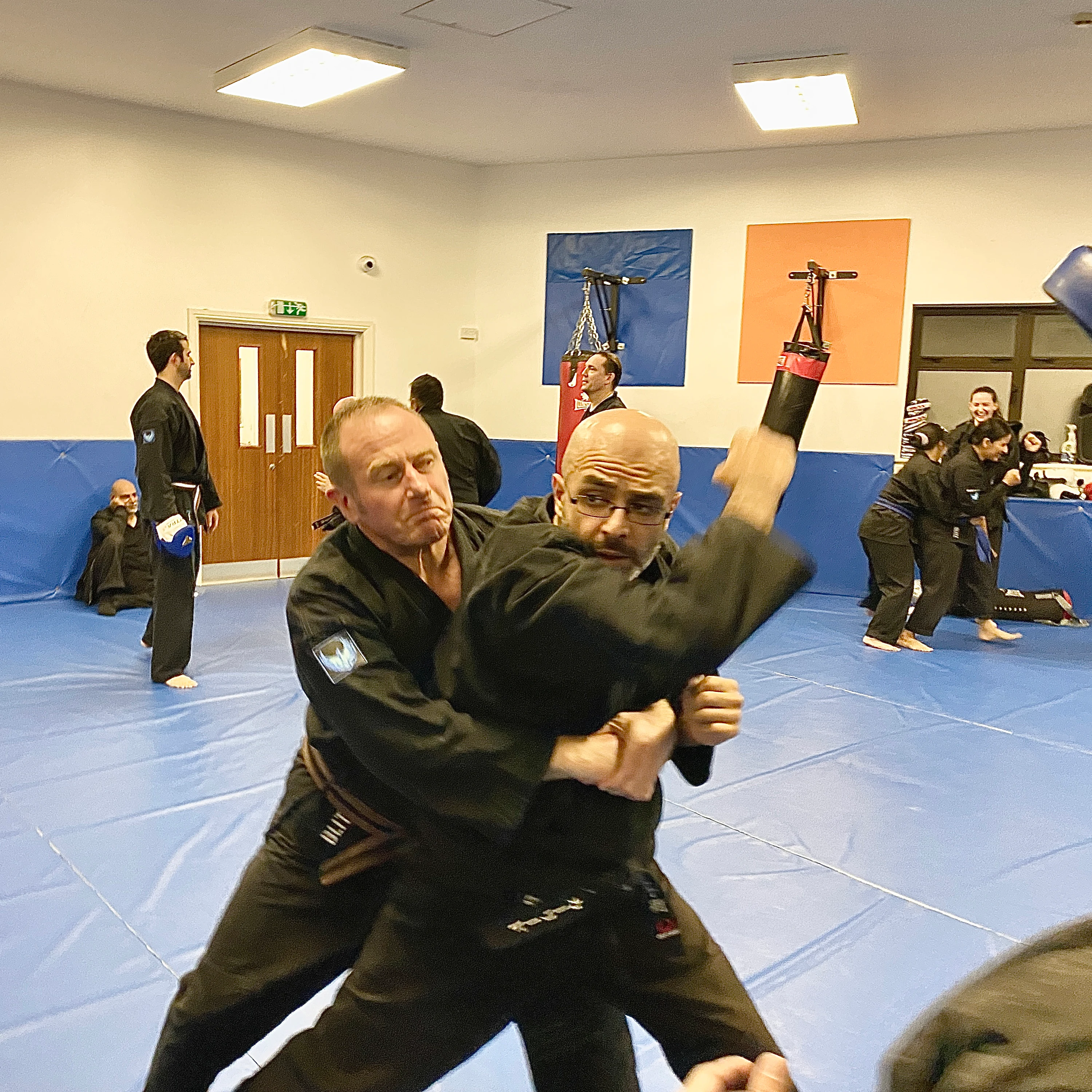 Majid Khalid of Shuhari Self Defence Slough doing multiple opponnents training in an MMA class