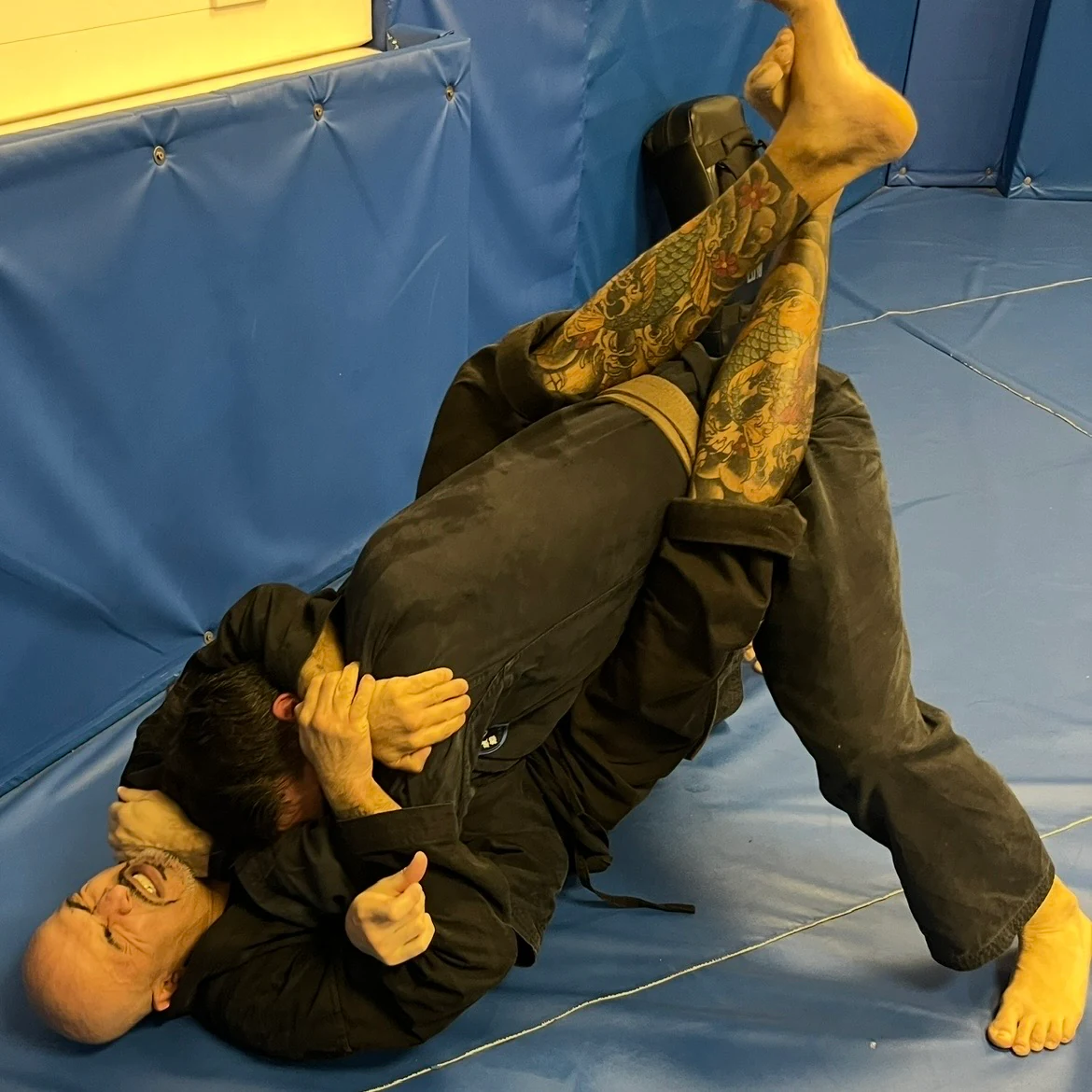 Majid Khalid of Shuhari Self Defence Slough practicing grappling in a martial arts class