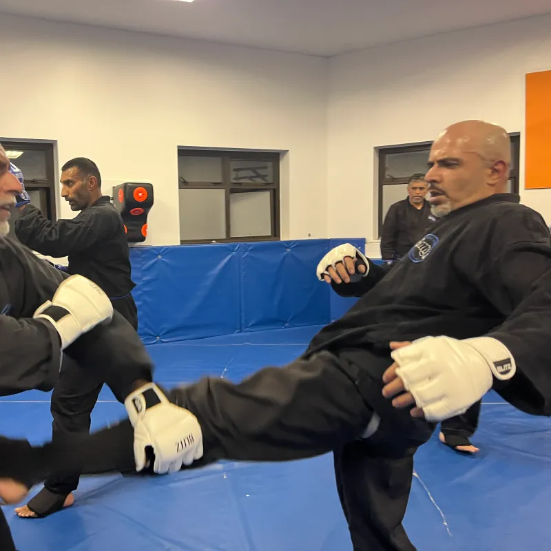 Majid Khalid of Shuhari Self Defence Slough doing contact sparring in a karate class