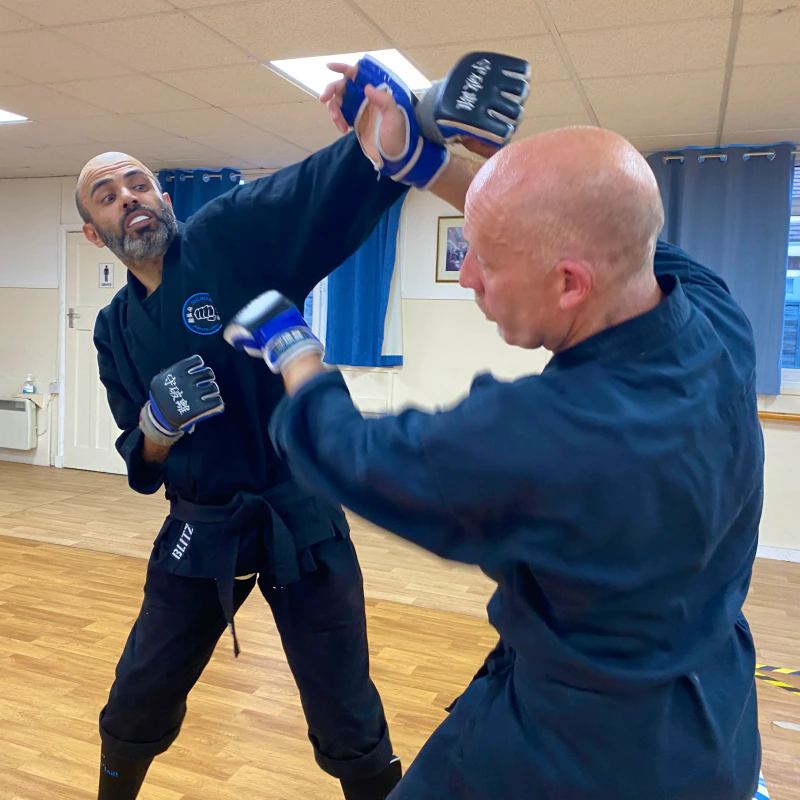 Majid Khalid of Shuhari Self Defence Slough sparring in a karate class in Cippenham with Andy Jones