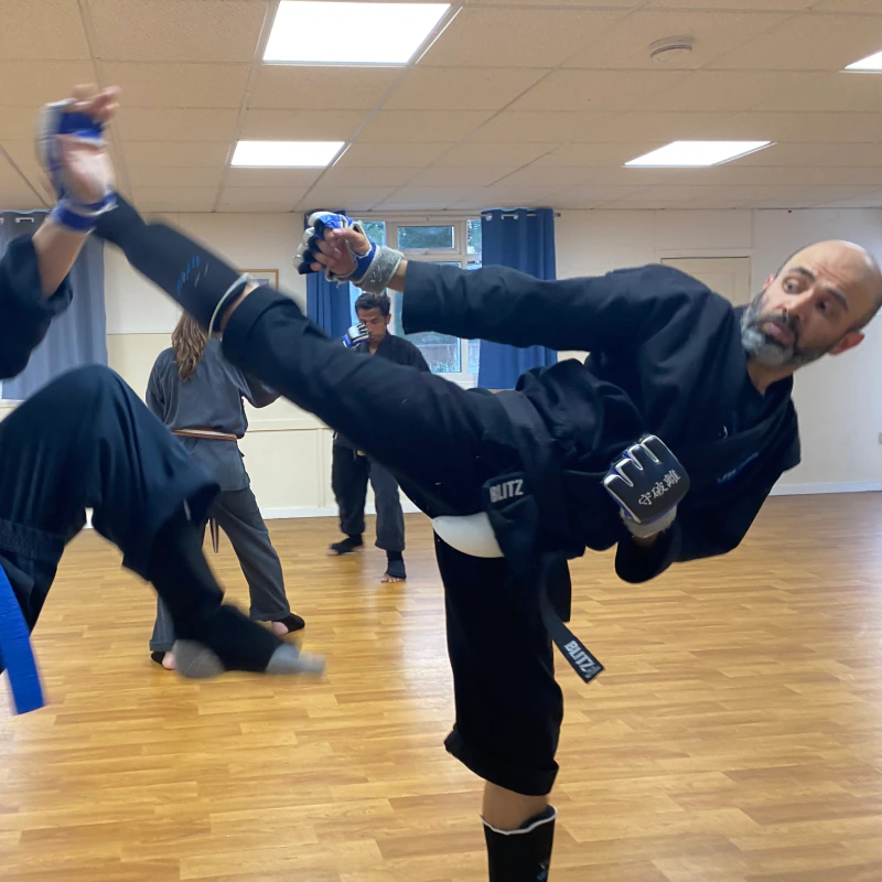 Majid Khalid of Shuhari Self Defence Slough sparring in a karate class in Cippenham